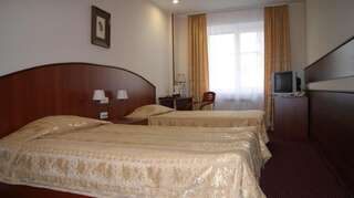 Гостиница Форум Магнитогорск Стандартный двухместный номер с 2 отдельными кроватями-1